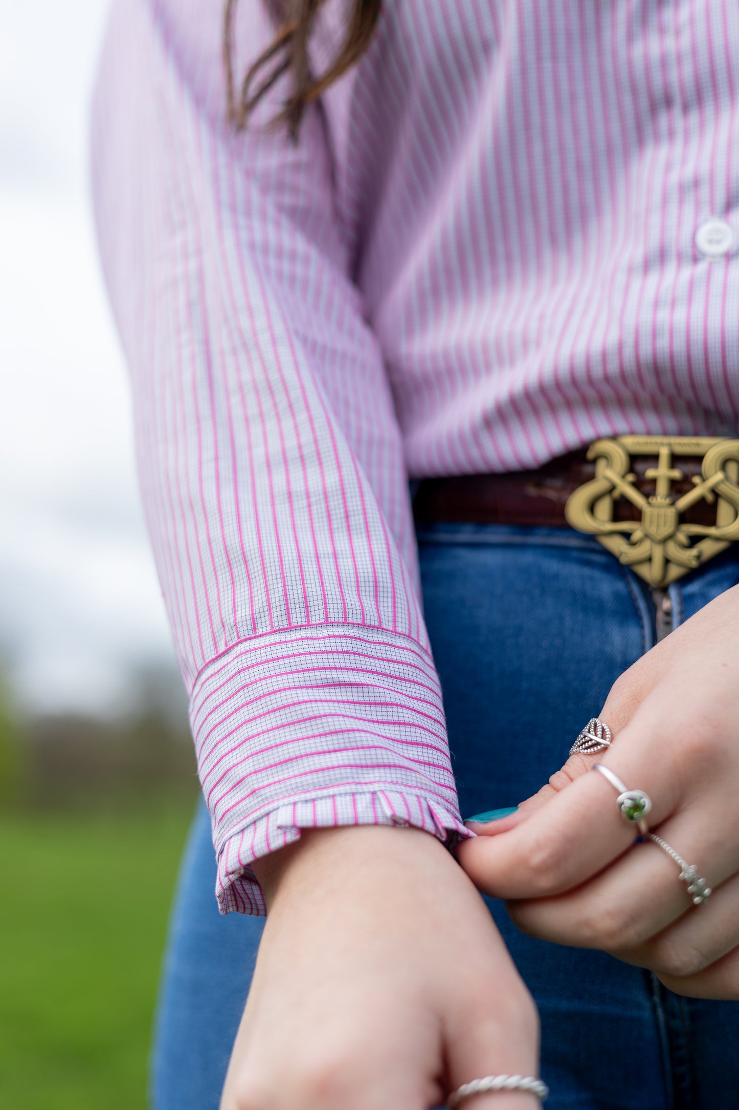 Model wearing Pink Stripe Norton Shirt sleeve detail close up